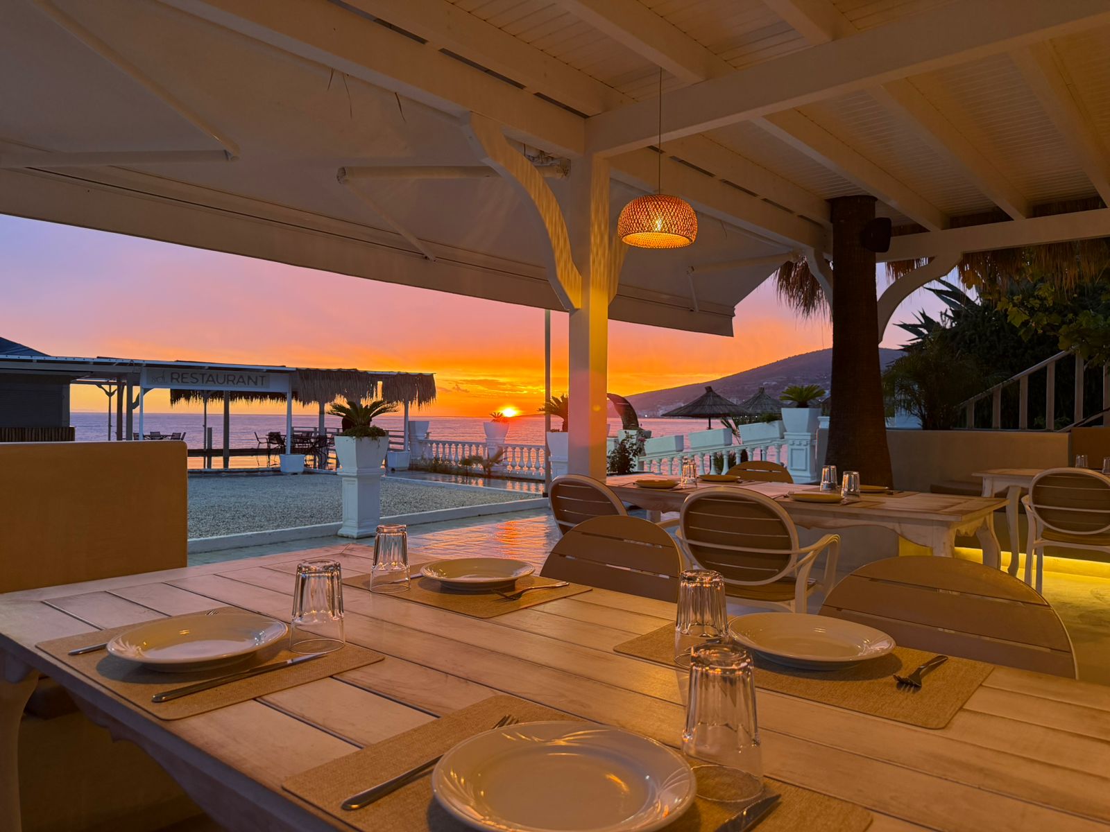 Sol Restaurant terrace at sunset with Ionian Sea view